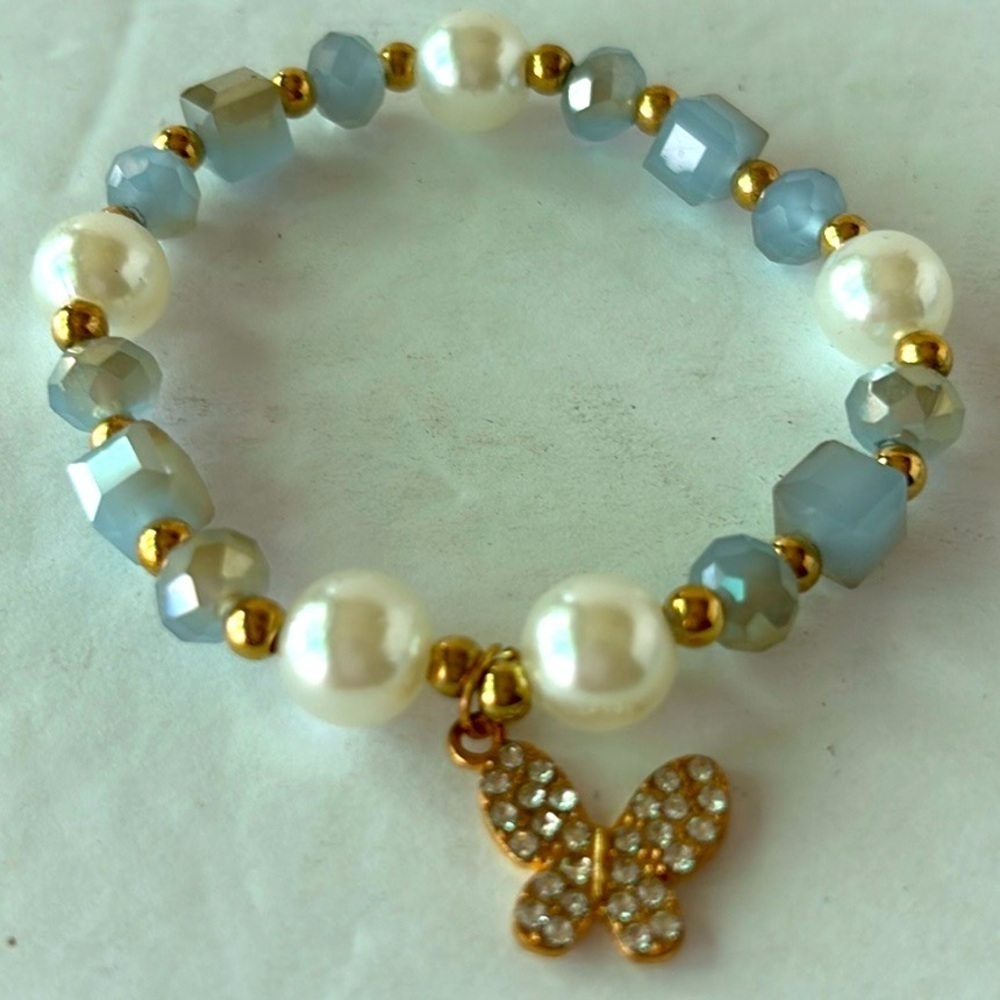 Handmade Light Blue, Faux Pearl  beaded bracelet With Butterfly Charm.